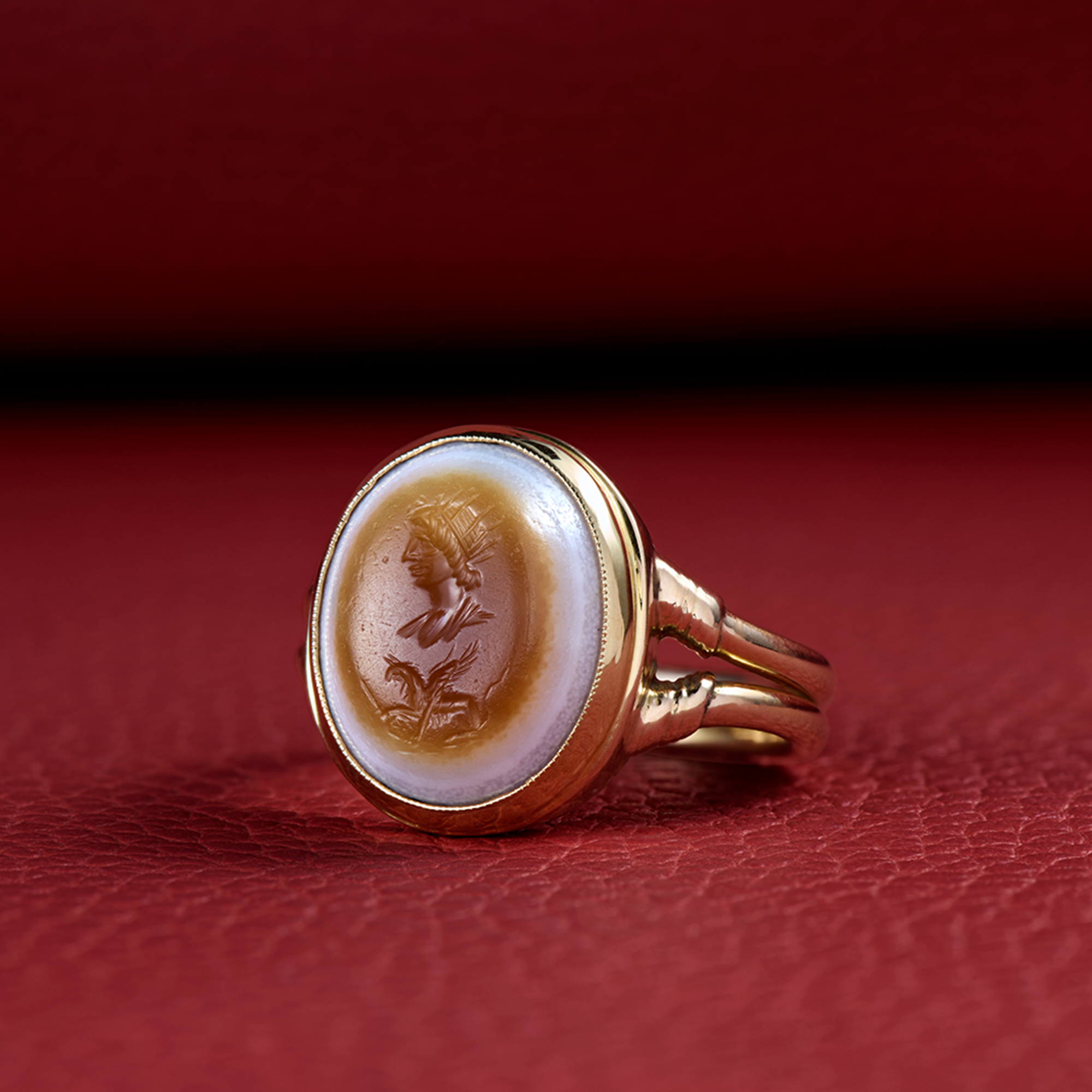 Roman intaglio ring depicting Helios and a Griffin